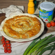 Spanakopita cu telemea de vacă Delaco în saramură, coaptă în formă de spirală